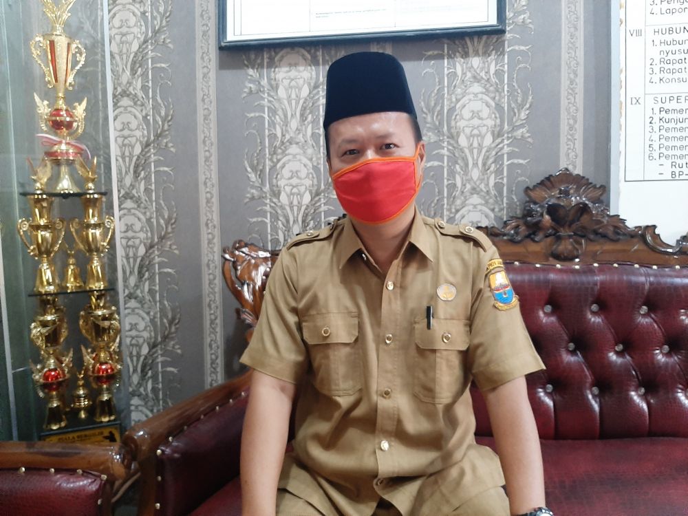 Kepsek SMAN 6 Batanghari Afrizal